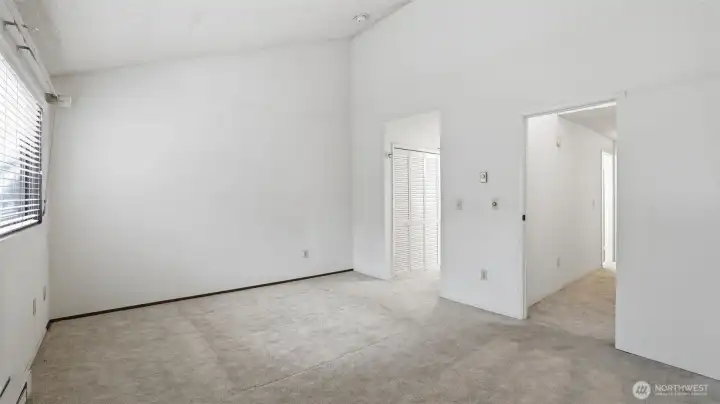 Primary suite with vaulted ceilings, dual closets and attached full bath Primary suite with vaulted ceilings, dual closets and attached full bath