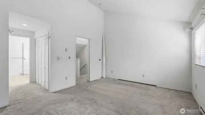 Primary suite with vaulted ceilings, dual closets and attached full bath Primary suite with vaulted ceilings, dual closets and attached full bath