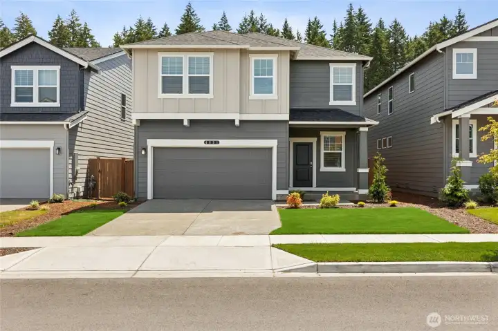Stunning curb appeal on this two-story home. Photos are representative only and may display different colors and or upgrades.