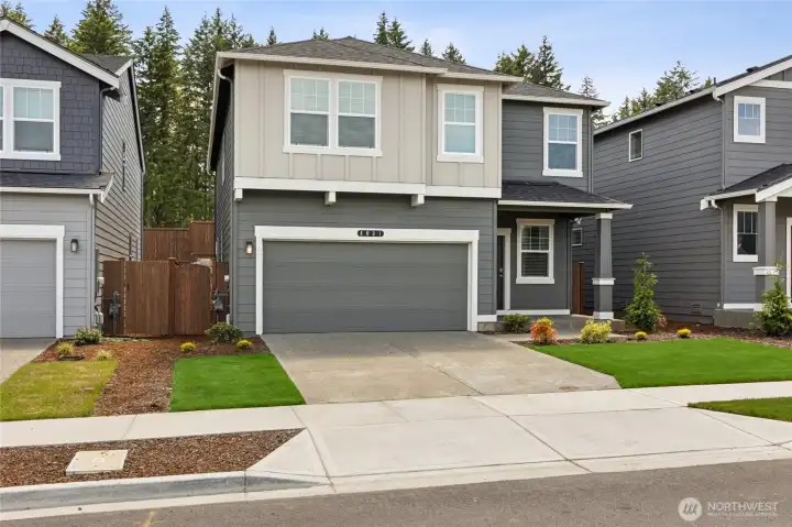 A second exterior view of this beautiful two-story home. Photos are representative only and may display different colors and or upgrades.