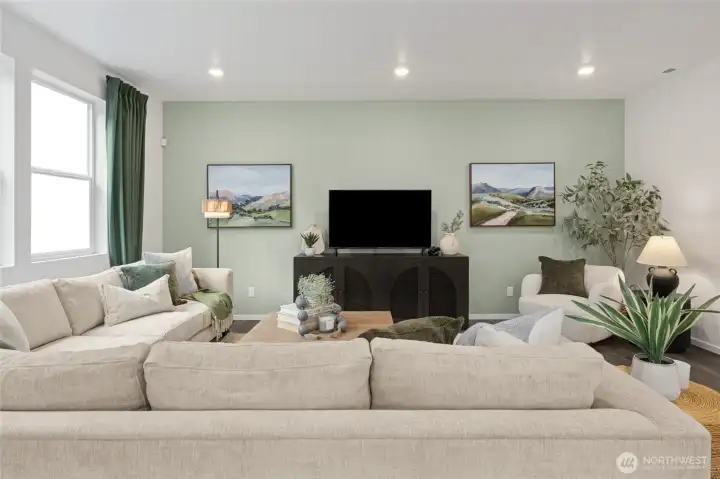 A wider angle of the great room highlights the generous space. Photos are representative only and may display different colors and or upgrades.