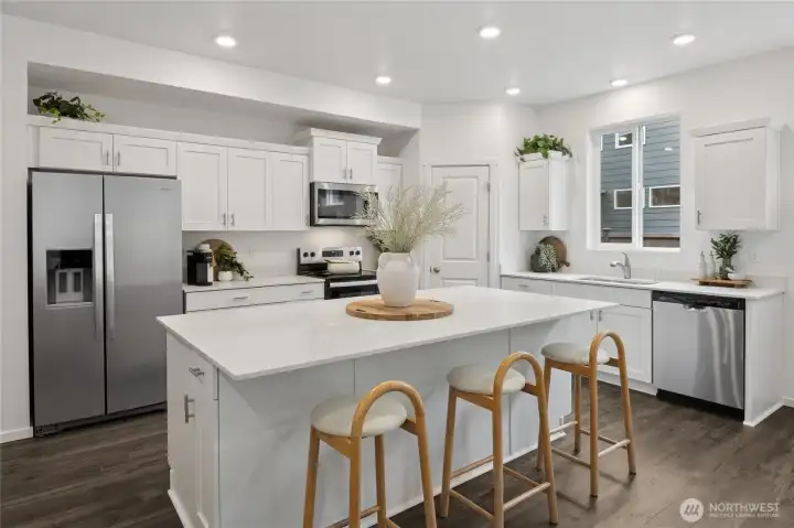 Another angle of the well-appointed kitchen. Photos are representative only and may display different colors and or upgrades.