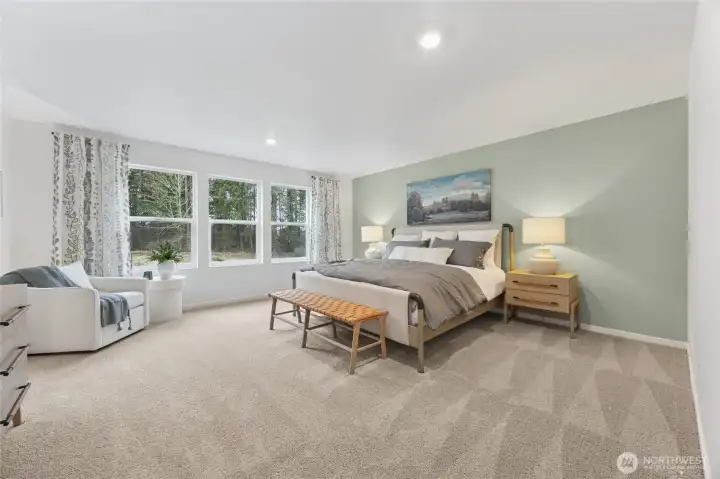 The generous owner's suite is a true retreat. Photos are representative only and may display different colors and or upgrades.