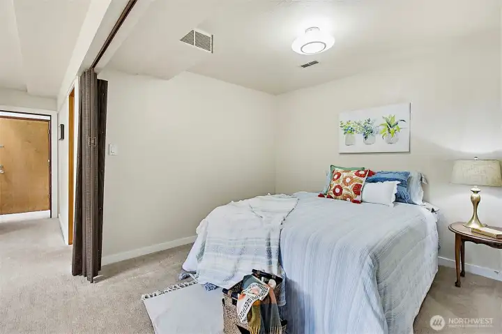 Garage Door Seen From Lower Level Rec Room/Bedroom Area