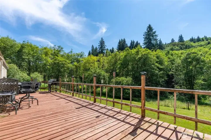 Expansive deck with view of beautiful surroundings Expansive deck with view of beautiful surroundings