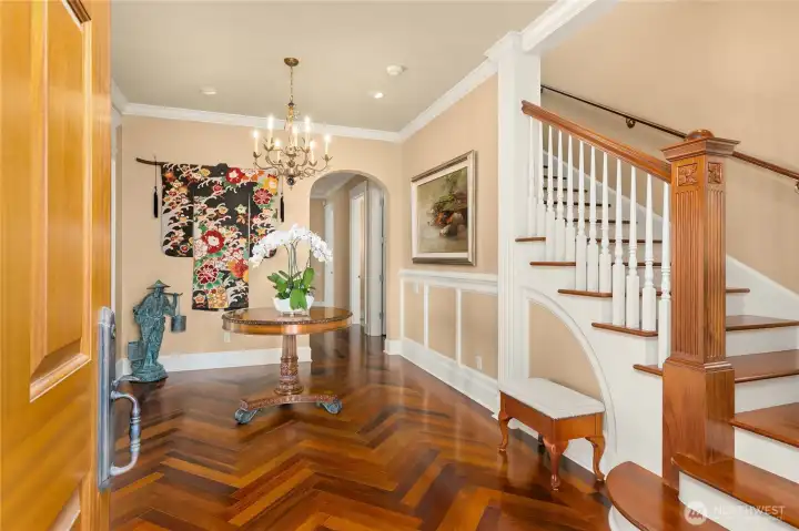 Entry greets you with solid ipe hardwood floors, impeccable woodwork and timeless beauty.