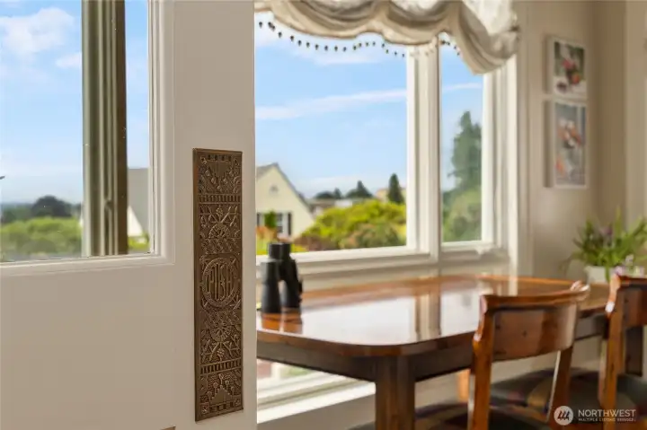 The swinging door to the kitchen. There are small details such as this door plate throughout that give the home a nod to the history that is Port Townsend.