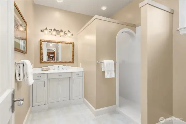 The shared bath on the upper floor with walk-in shower.