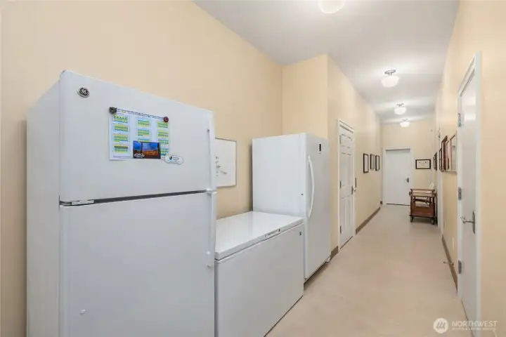 Tons of storage on the lower level. The garage is at the end of the hall to the left and the wine cellar is to the right.
