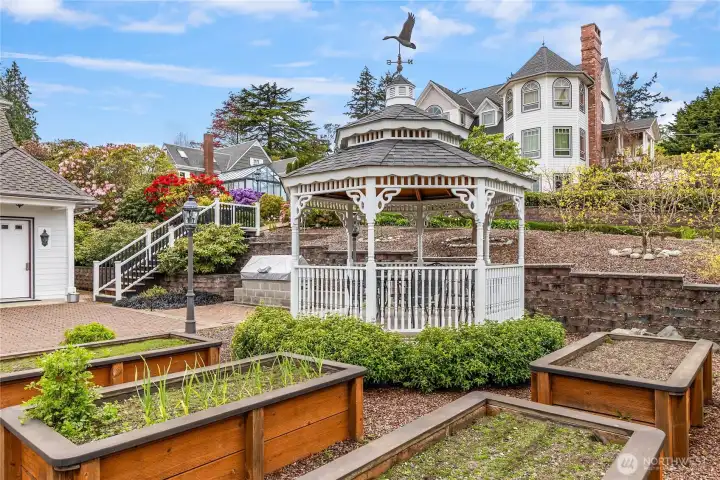 The gardens are delightful with raised beds, mature plantings, abundant orchard and gazebo