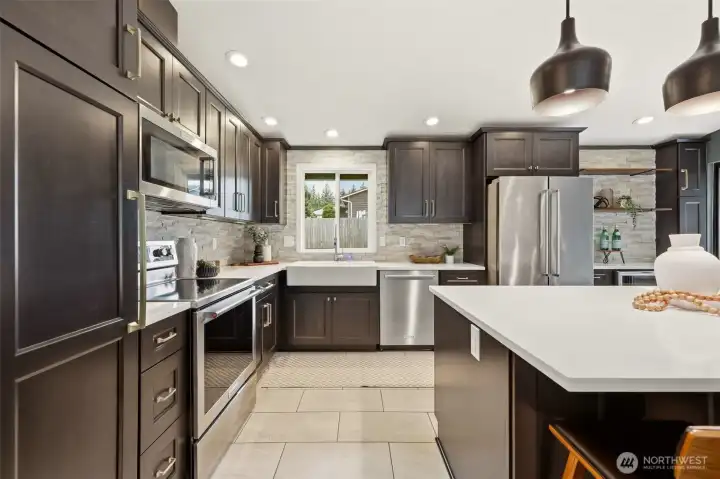 A beautifully updated kitchen that's ready for everything from busy mornings to dinner with friends. A beautifully updated kitchen that's ready for everything from busy mornings to dinner with friends.
