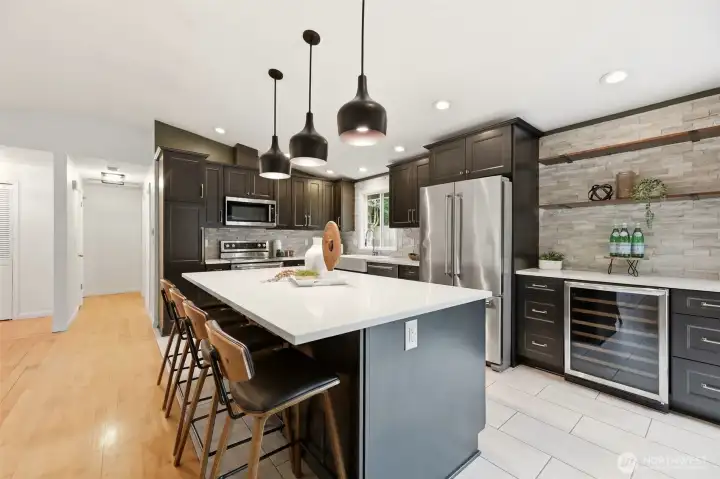 Modern finishes + thoughtful updates make this kitchen shine. Modern finishes + thoughtful updates make this kitchen shine.