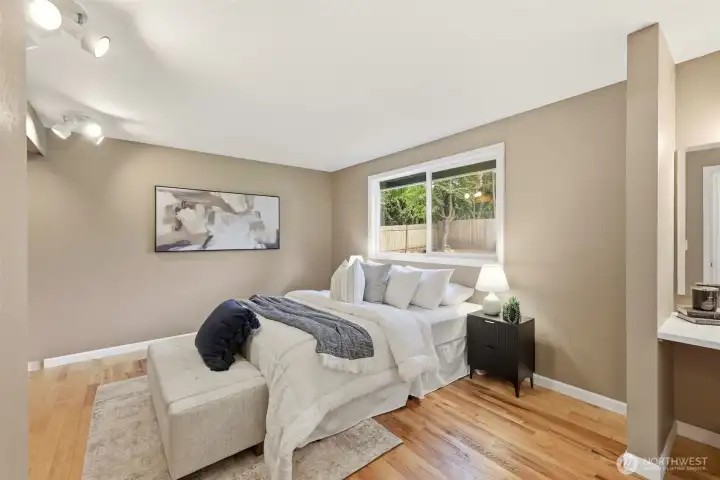 Wake up to peaceful backyard views from the primary bedroom. Wake up to peaceful backyard views from the primary bedroom.