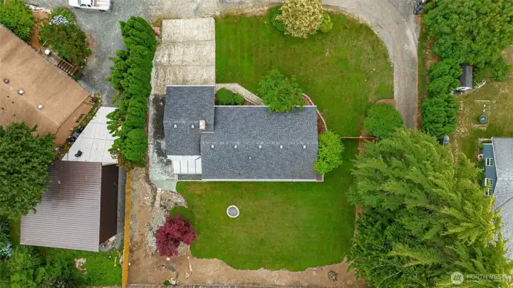 . A bird's-eye view showcases the generous lot. . A bird's-eye view showcases the generous lot.