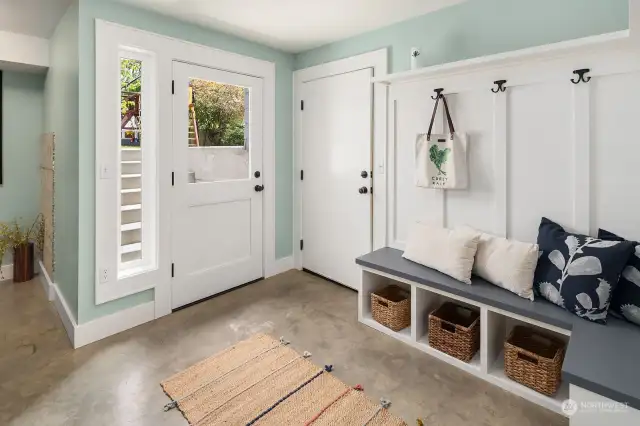 The mud room is even cute!  It offers access to the 2 car garage as well as the backyard.