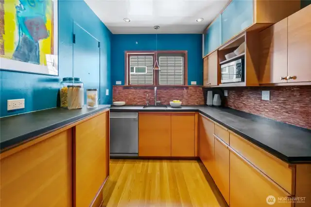 Lower cabinets by Henrybuilt (includes corner cabinet sliding shelf unit.) Fronts are clear vertical grain Douglas-fir.