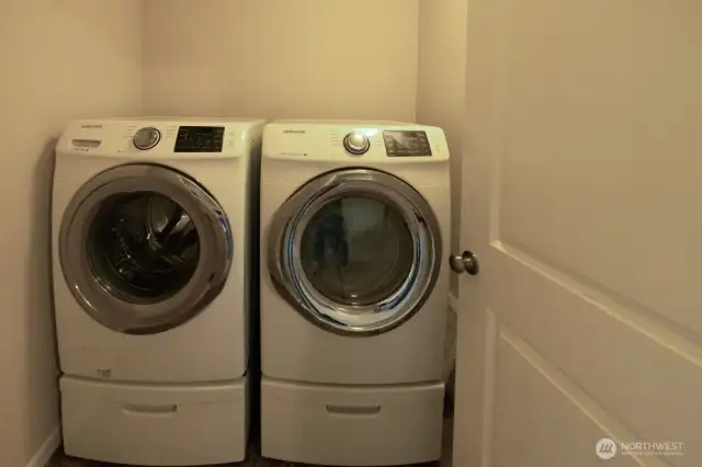 Conveniently located utility room upstairs. Front load washer and dryer stay.