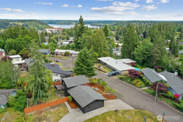 Massive corner lot with peek a boo view of the water from the living room and back deck