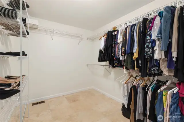 Primary walk-in closet.