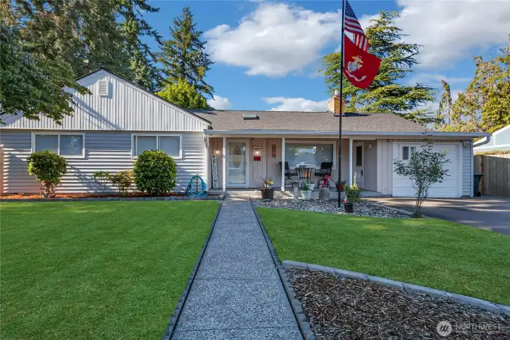 Welcome home to 6123 Fairlawn Dr SW in Lakewood!  This charming property greets you with a lush green lawn and a warm, inviting exterior. From the moment you arrive, you’ll feel at home—whether you’re relaxing on the front porch or stepping inside to discover all the comfort and charm this residence has to offer.