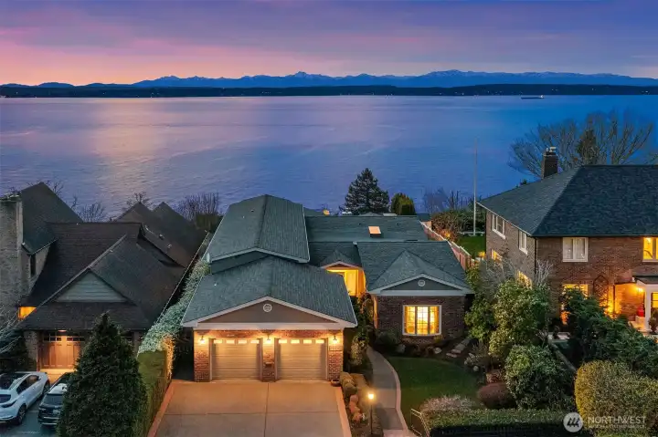 Large garage space with extra parking. Private road shared with neighbors.