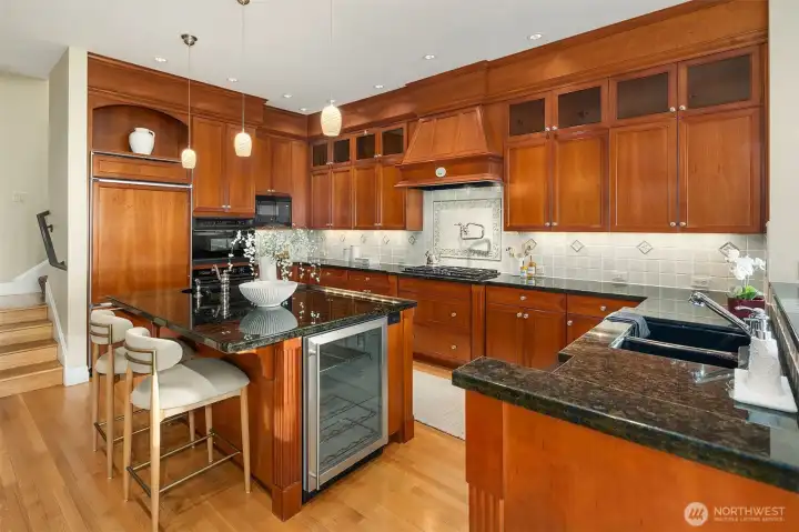 Looking SE to Kitchen with all the features a discriminating homeowner desires. Double oven and two disposals too.