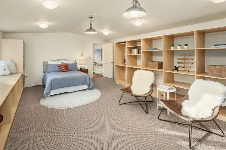 Second floor Third Bedroom with expansive space and shelving plus ample  closet space.