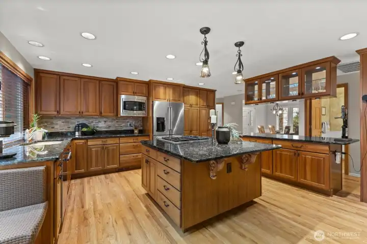 Expansive kitchen with stainless steel appliances and kitchen island