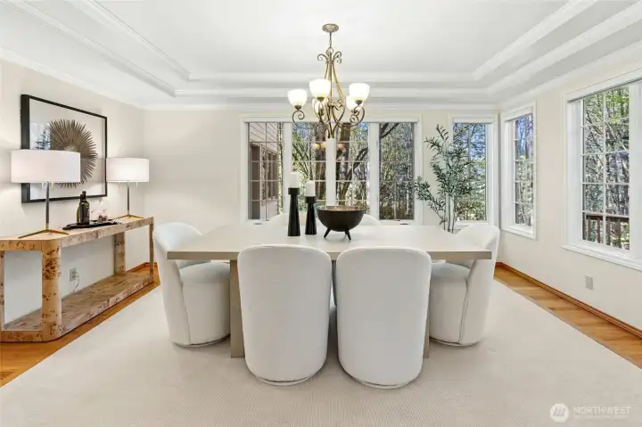 Spacious dining room with amazing trim detail.