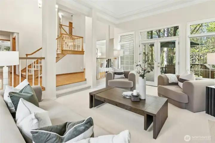 Soaring ceilings, gorgeous trim details and walls of windows to let in the territorial views.
