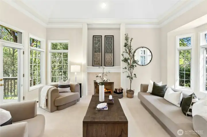 Stunning living room with fresh paint and carpet.