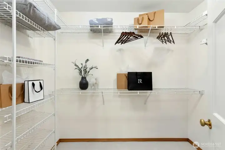 Primary walk-in closet.