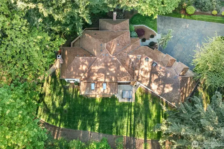 1.36 acres of forever privacy and beauty.