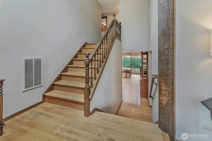 Hardwood floor landing and stairs.