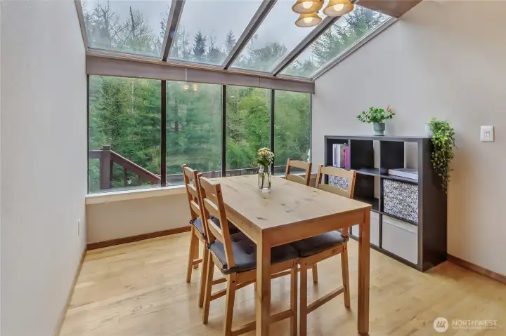 Breakfast nook under the windows and skylights.