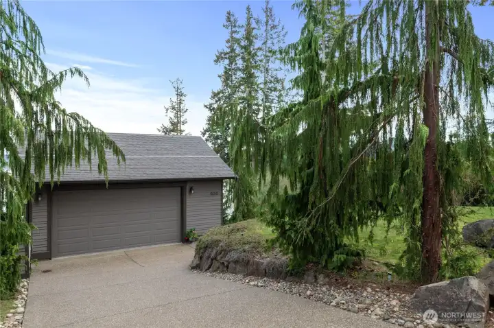 2 car detached garage with large storage/workshop below .