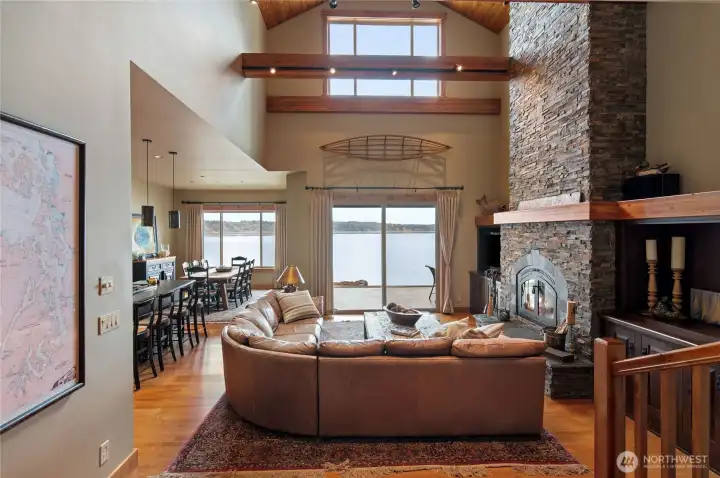 Welcome home! Stunning custom characteristics from the open beams to the massive fireplace and soaring ceilings. Hardwood floors flow through the main living area.