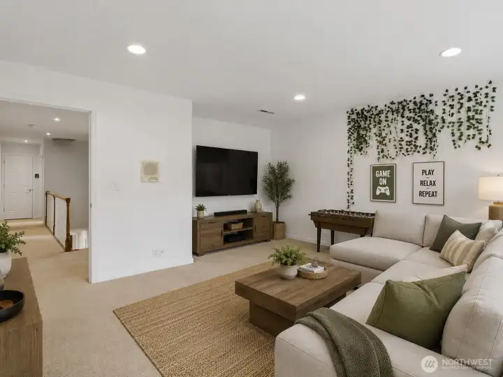 Bonus room that could be used as a game room or guest room or additional office space ((Virtually staged to show potential)
