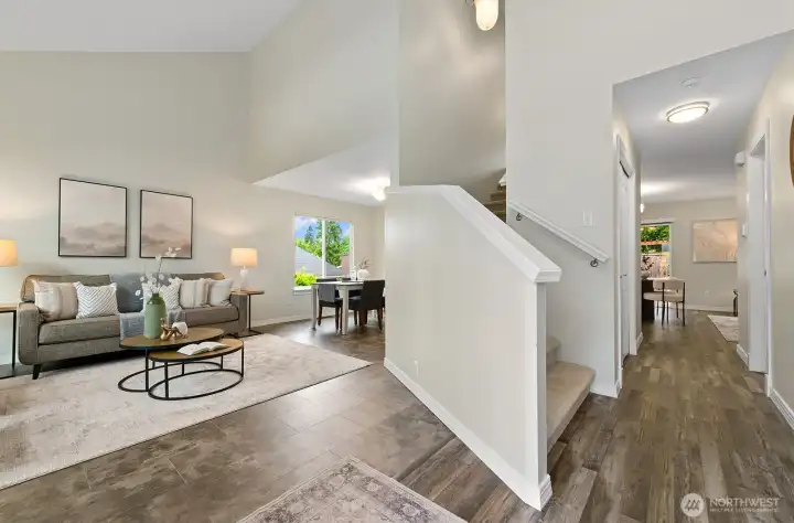 Soaring vaulted entry with luxury vinyl plank floors & open layout. Soaring vaulted entry with luxury vinyl plank floors & open layout.