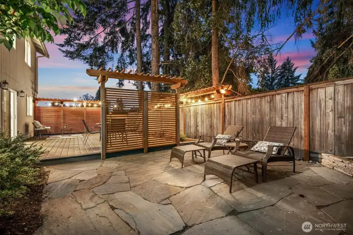 Flagstone lounge patio with integrated lighting & stunning western sunsets, prime for star gazing. Flagstone lounge patio with integrated lighting & stunning western sunsets, prime for star gazing.
