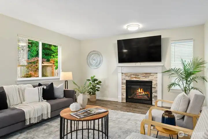 Gas fireplace with stone surround & Roku TV conveys with the home. Gas fireplace with stone surround & Roku TV conveys with the home.