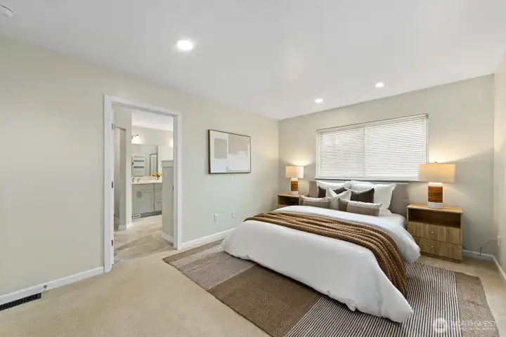 Primary en-suite offers a soft landing with heated floors. Primary en-suite offers a soft landing with heated floors.