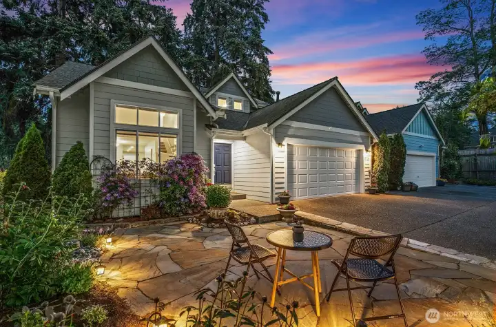 Illuminated flagstone patio glows under a spectacular Kennydale sunrise. Illuminated flagstone patio glows under a spectacular Kennydale sunrise.