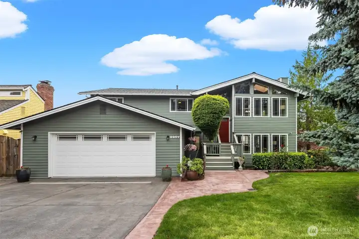 Welcome home! Two car garage plus additional off-street parking. New roof 2026.