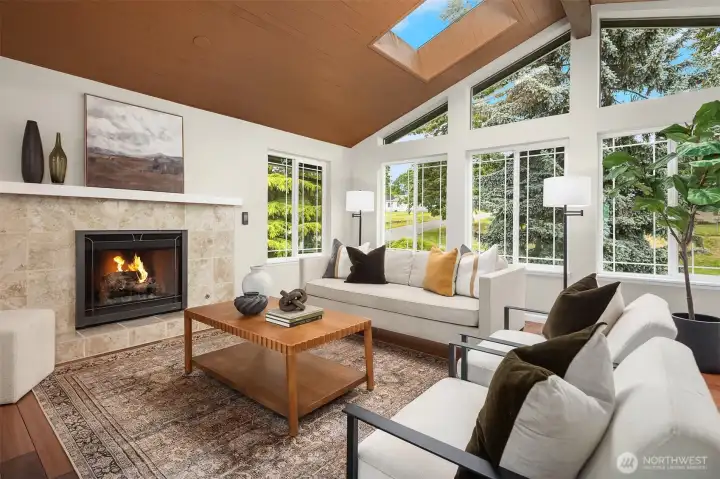 Mid-Century vibes with slat vaulted ceilings. Gas fireplace.