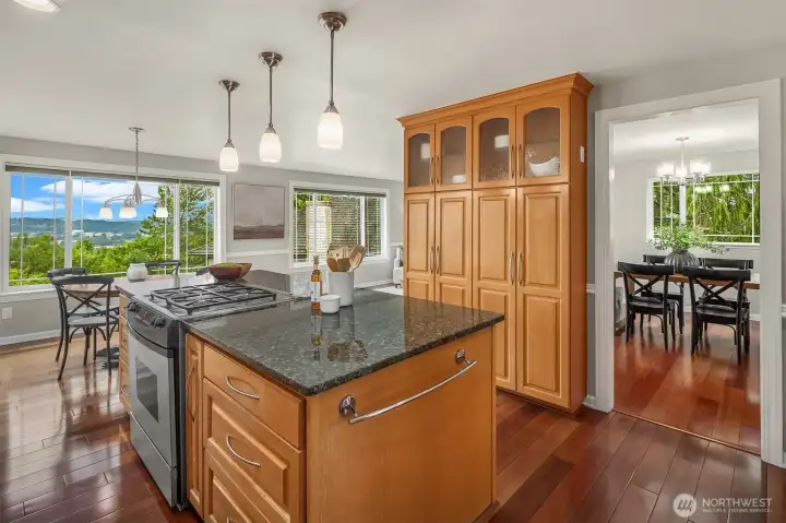 Stainless appliances including gas range.