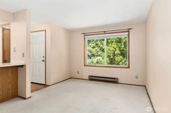 The inviting living room offers nice light, with the layout maximizing the space!