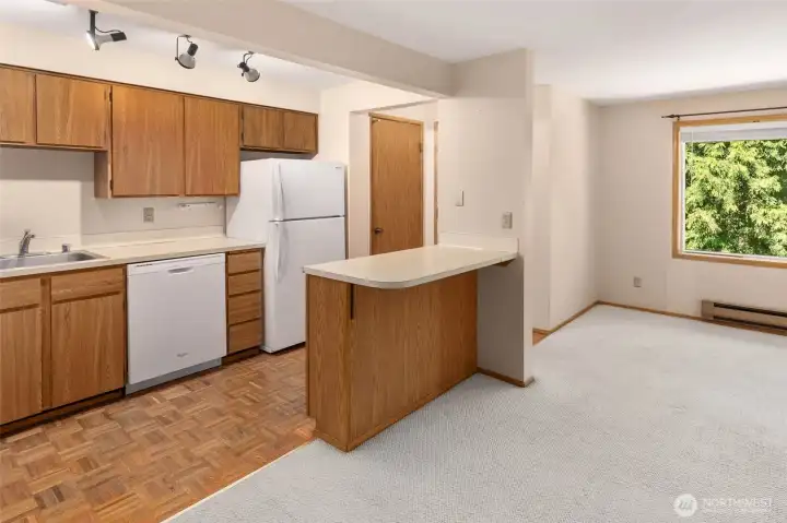 Fantastic use of space here! Note how the natural light is enjoyed from the kitchen, too.