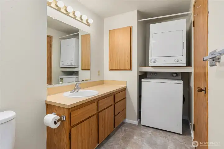 That cabinet opens to deep, great storage! Nice to have the convenient washer/dryer out of the kitchen/main living spaces.