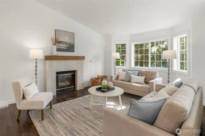 Enjoy gas fireplace with new tile surround.